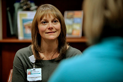 Amanda Hitchings, PsyD listens to a mother in recovery.