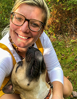 Tiffany Boyd, MHA, RN, ACM-RN, and her rescue pup "Aure"