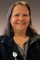 AnnMarie Coppo is a white woman with medium-length brown hair
