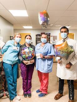 Mollie Torrey, OT, Farmun; Bekka Haraldson, PT, Farnum; Laurie Carr, RN, Thompson Unit; and Dr. Aalok Khole, Infectious Disease