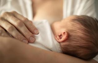 Breast-feeding newborn