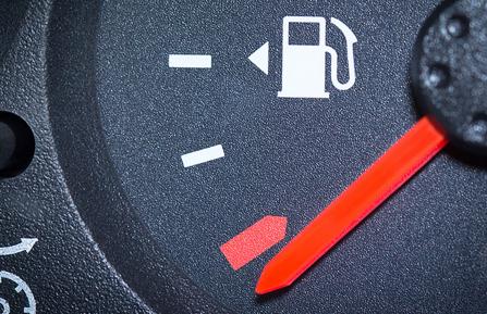 Automobile gas gauge indicating that the tank is empty