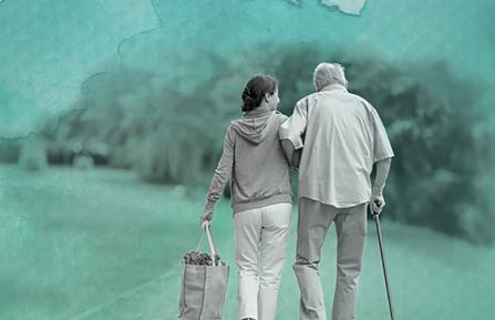 Caring for a loved one with dementia story - elderly man with younger woman.