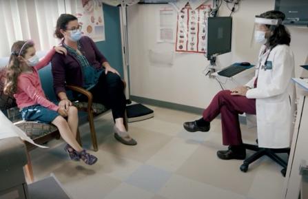 Patients and provider wearing personal protective equipment