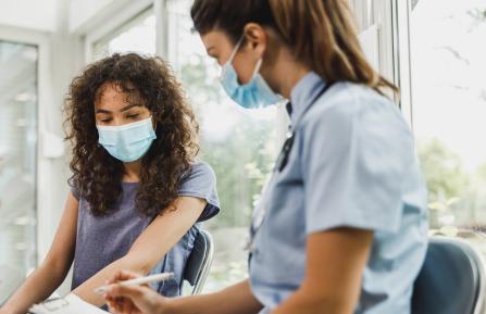 Nurse talking with a patient