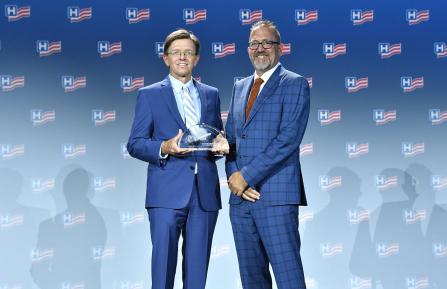 Shawn LaFrance and Nelson Hayden accepting NOVA award