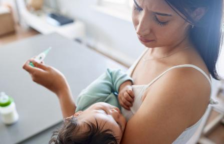 Mom with sick baby