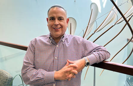 David Streeter stands in Dartmouth Cancer Center at Cheshire Medical Center, now cancer-free.