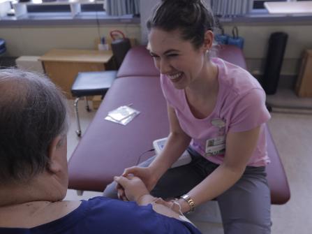 Physical therapist with patient