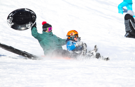 Parent and child sledding