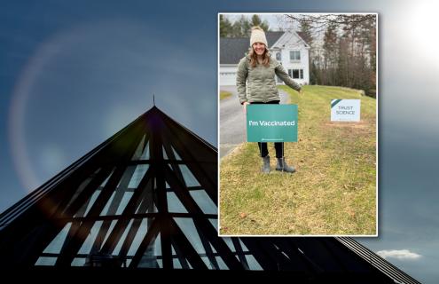 Image of female nurse placing signs on her lawn over generic image over DHMC dome.