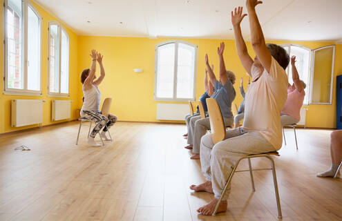 A chair yoga class