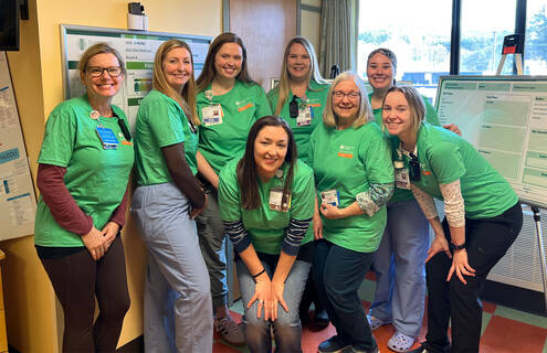 A group of nurses pose for a photo