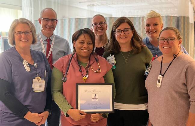 Cheshire's nursing leadership presents Tamika with the Rising Star Award