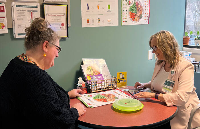 A patient learns about diabetes care management