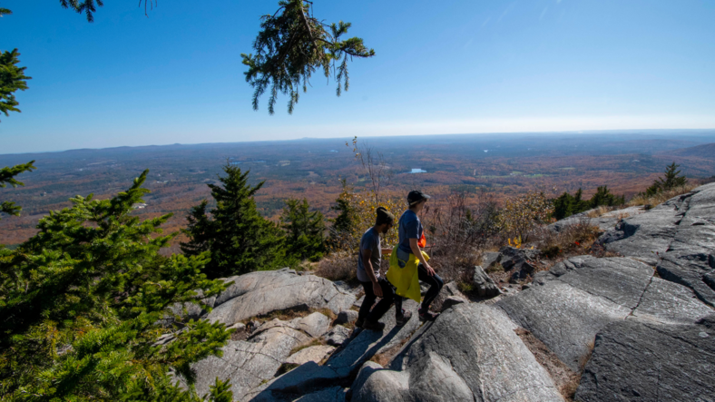 Couple climbing mount monadnock